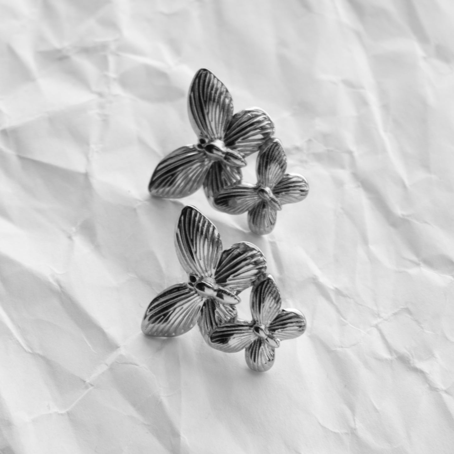 BUTTERFLY OORBELLEN ZILVER