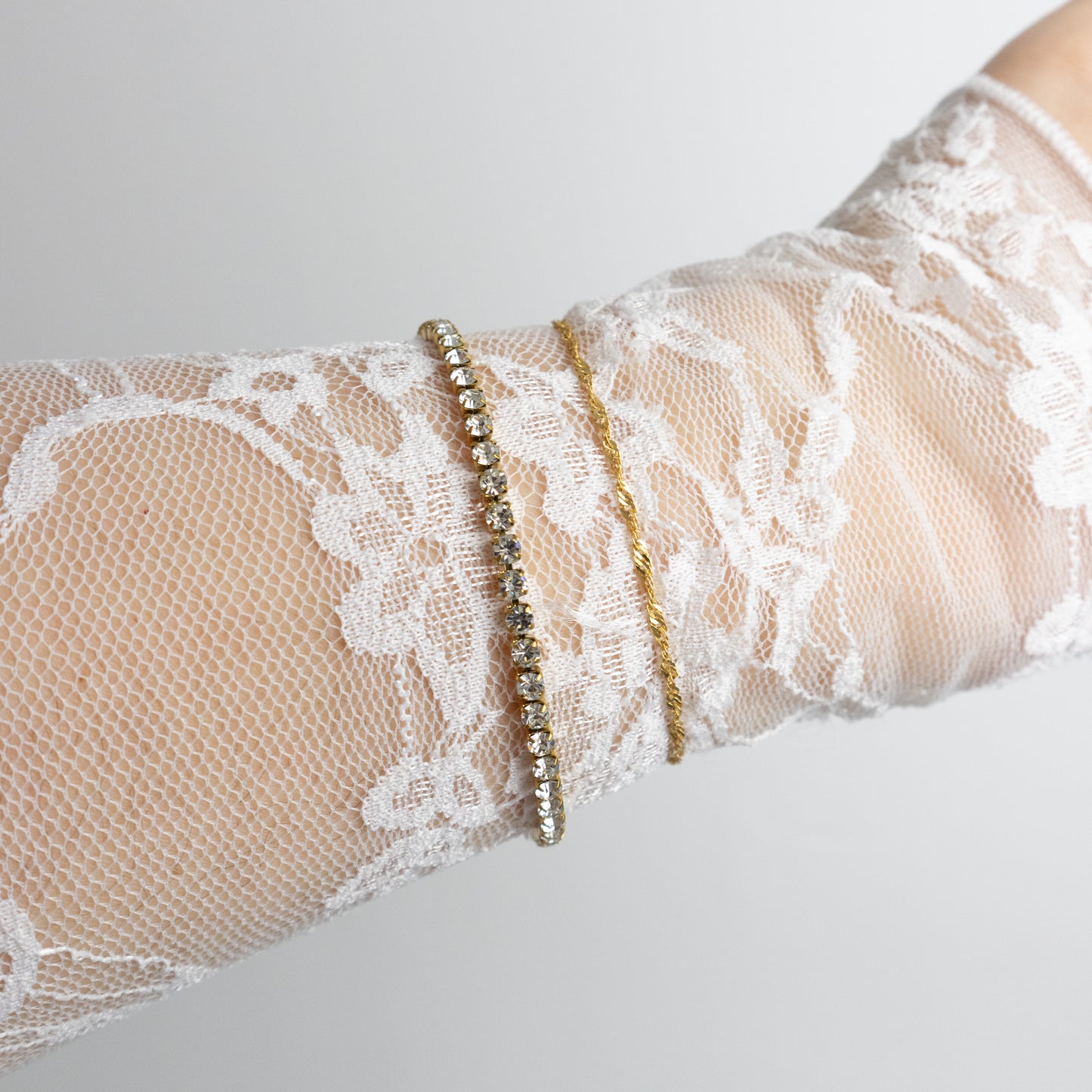 SMALL TWIST ARMBAND GOUD