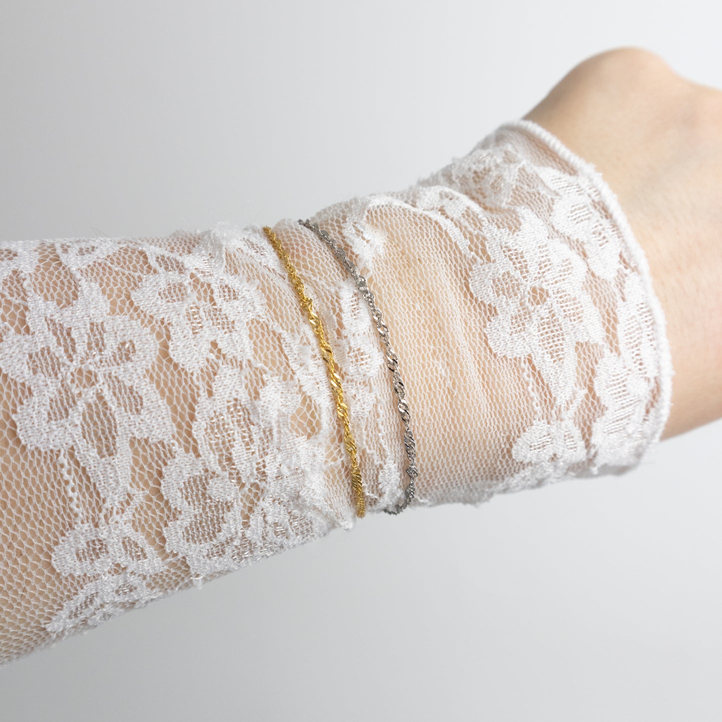 SMALL TWIST ARMBAND ZILVER