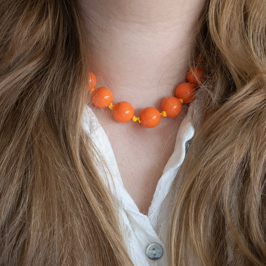 BIG BEADS KETTING - ORANJE/GOUD
