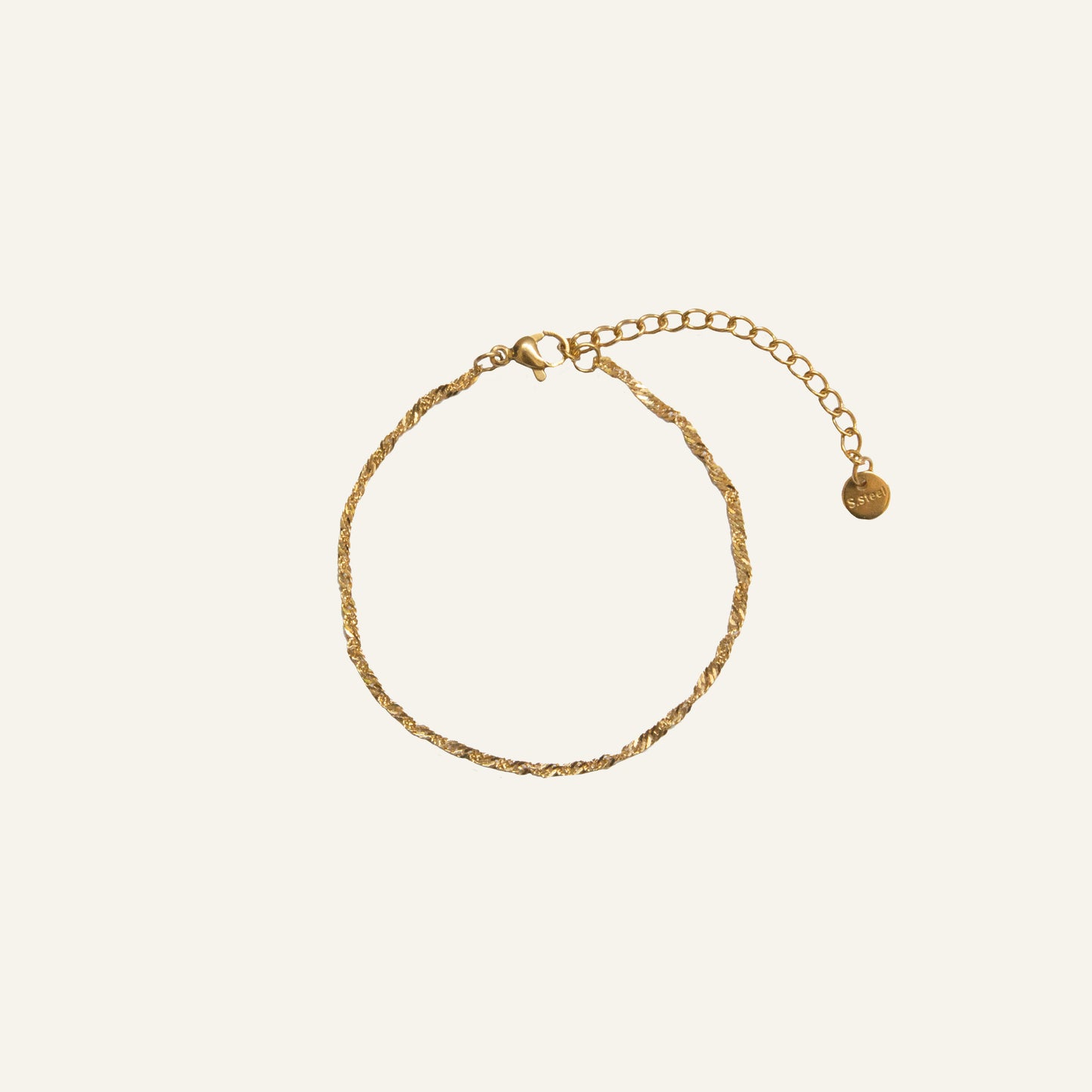 SMALL TWIST ARMBAND GOUD