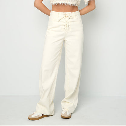LACED UP JEANS