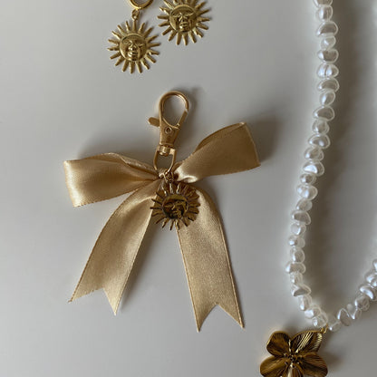 Sunny Bow Charm - Gold/Beige