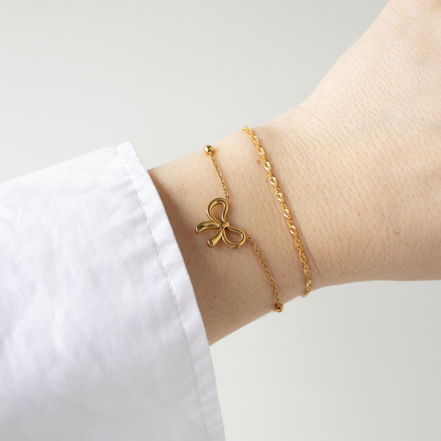 BOW ARMBAND GOUD